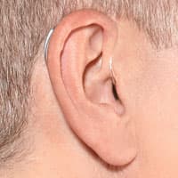 behind-the-ear-hearing-aid-on-ear-BTE.jpg