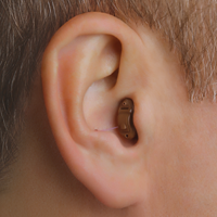 behind-the-ear-hearing-aid-on-ear-BTE.jpg