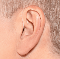 behind-the-ear-hearing-aid-on-ear-BTE.jpg
